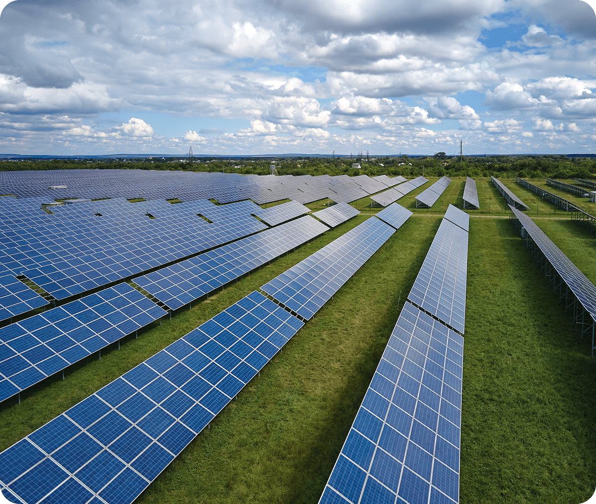 Solar farm under cloudy sky